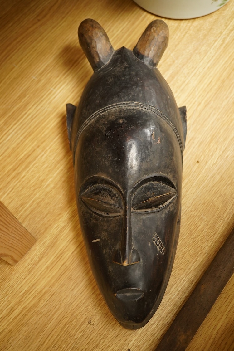 African tribal art interest; a Senufo mask of the Ivory Coast, 41cm